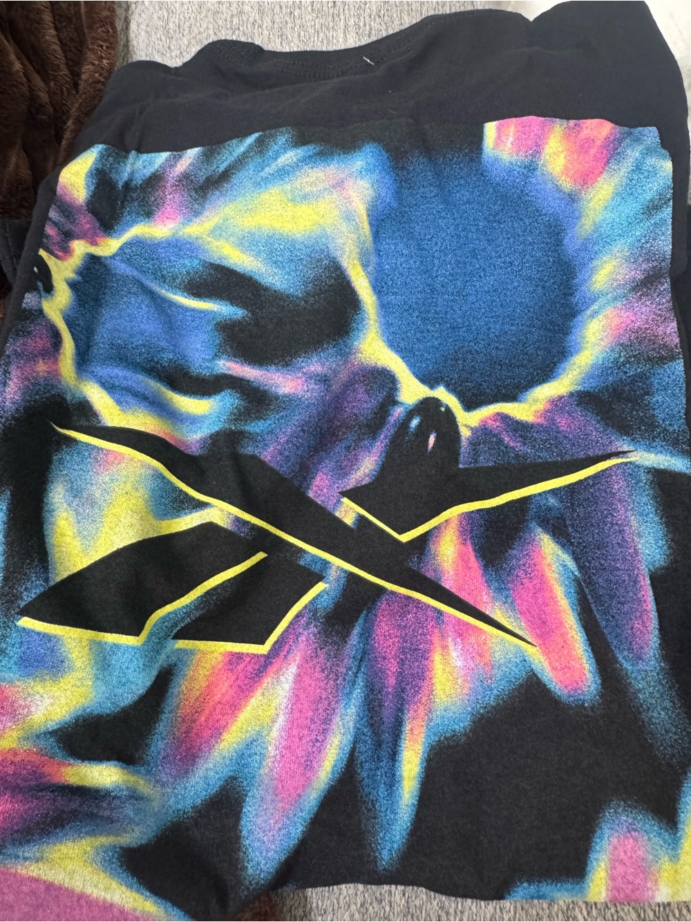 Black Graphic Tee with Neon Rainbow Design